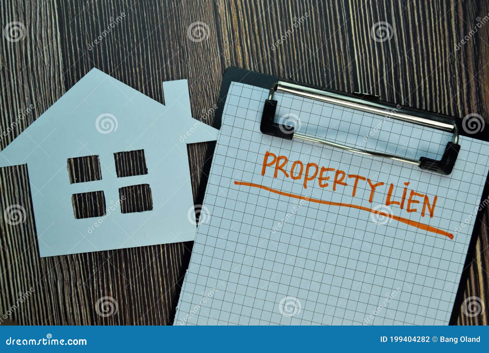 Property Lien Write On A Paperwork Isolated On Wooden Table Business Or Financial Concept Stock