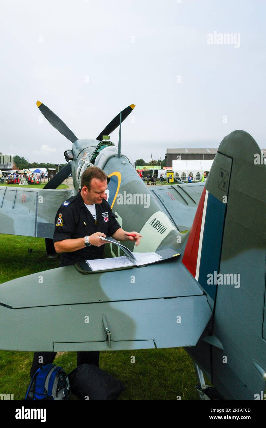 Raf Battle Of Britain Memorial Flight Crew Filling Out Paperwork On The