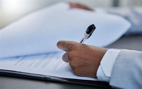 Read The Fine Print S Businessman Filling Out Paperwork In His Office