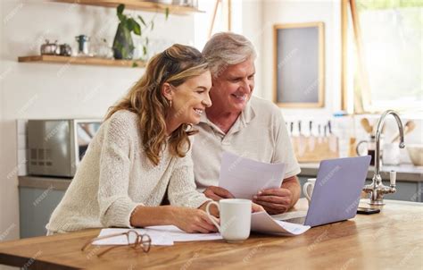 Retirement Investment And Couple On Laptop And Paperwork For Online Digital Banking