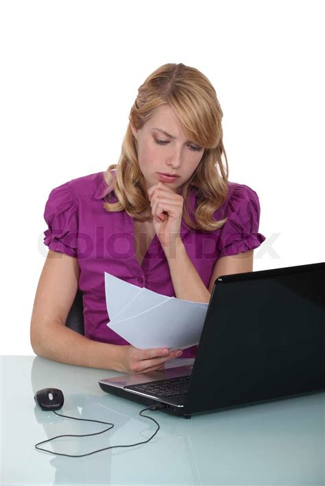 Secretary Reviewing Paperwork Stock Image Colourbox