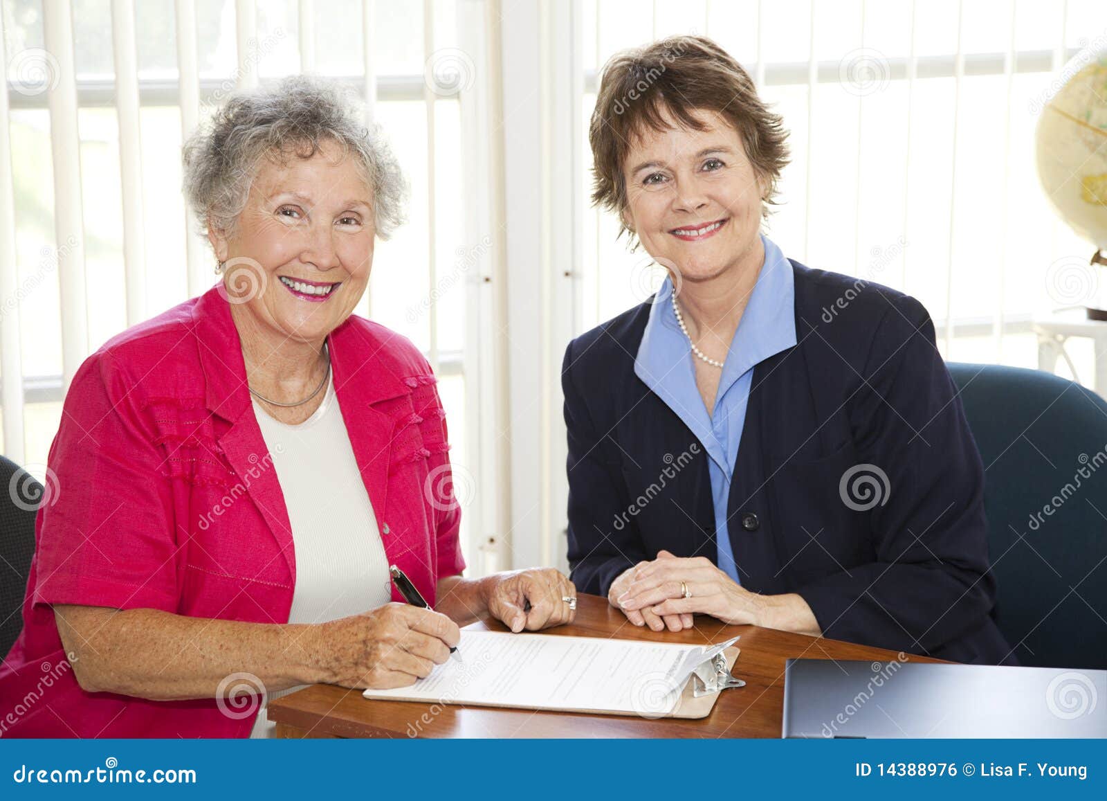 Senior Woman Signing Paperwork Stock Photo Image Of Desk Business