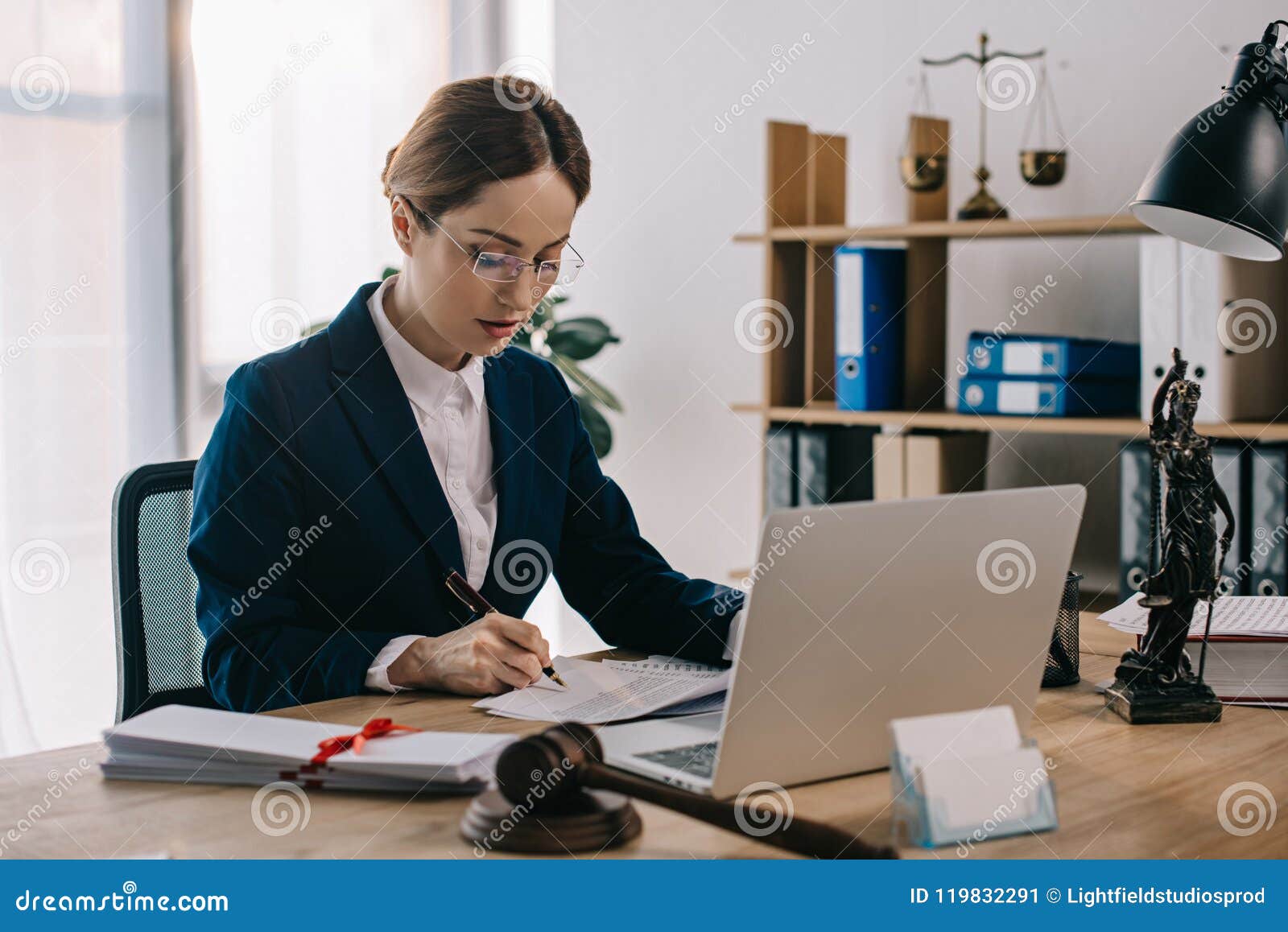 Side View Female Lawyer Doing Paperwork Workplace Laptop Office Stock