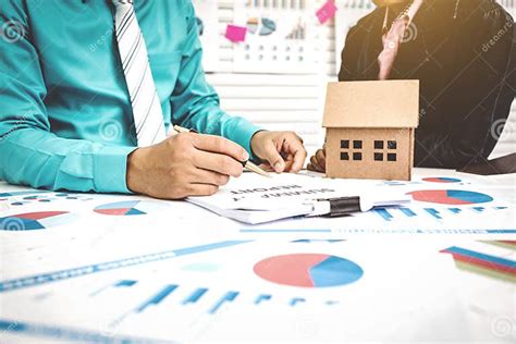 Signing Of Paper Work Home Buying With Broker And Buyer Stock Photo Image Of Financial Hand