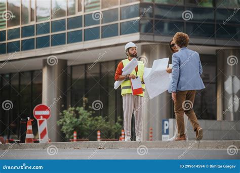 Successful Urban Architects Discussing Project Details Outdoors Stock Image Image Of