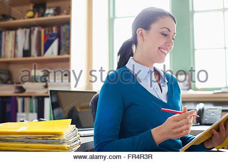 Teacher Marking Paperwork Stock Photo Royalty Free Image 8126995 Alamy