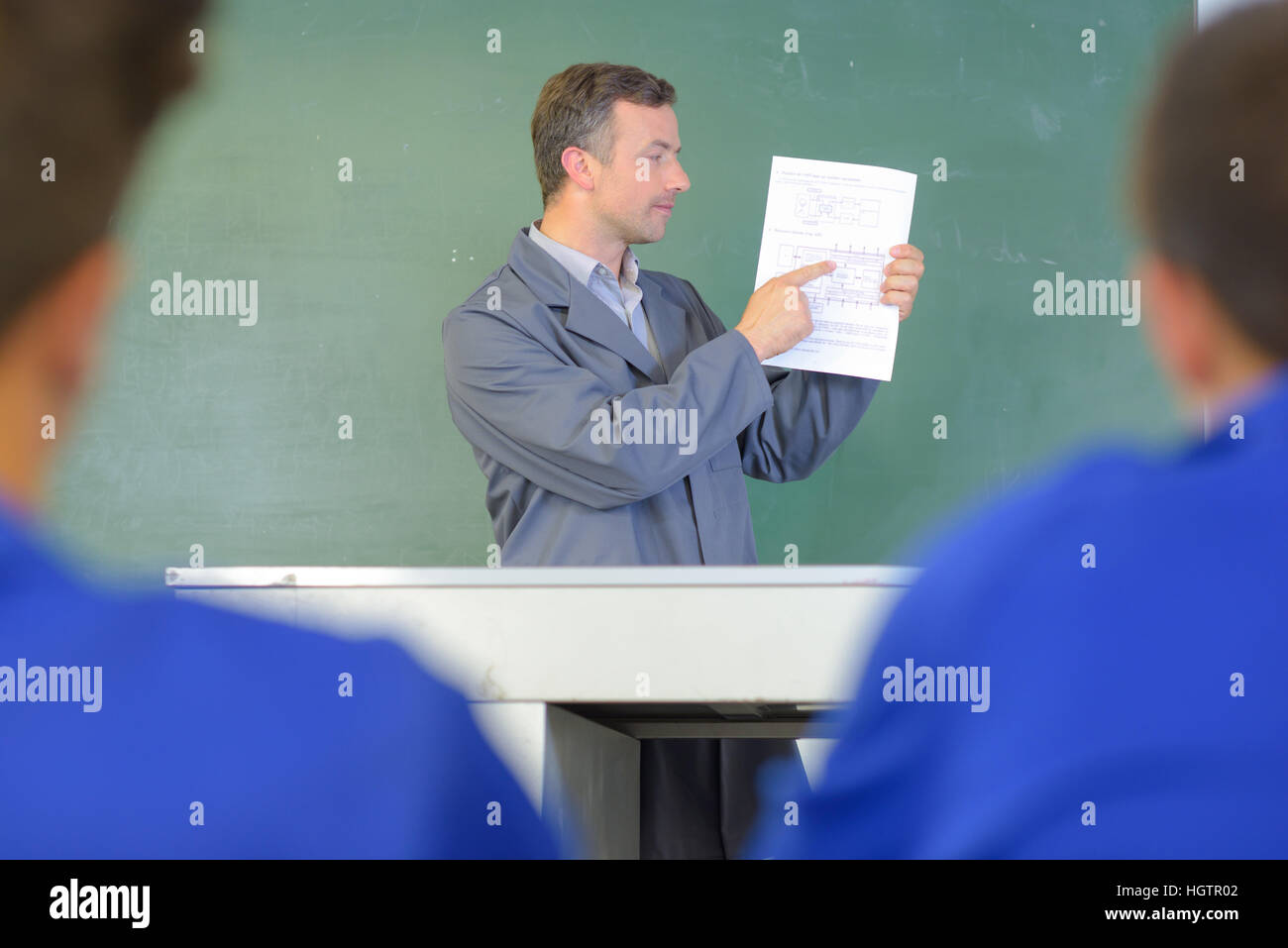 Teacher Pointing To Paperwork Stock Photo Image Of Tradesman Teacher 118383798