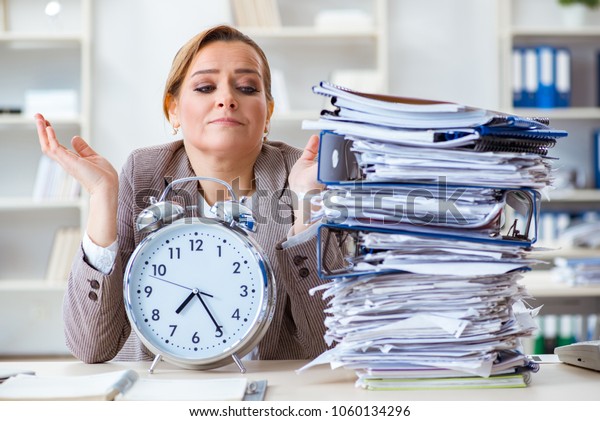 The Businesswoman Workaholic Trying To Finish Urgent Paperwork Stock