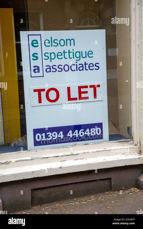 To Let Estate Agent Sign In Empty Shop Window Elsom Spettigue