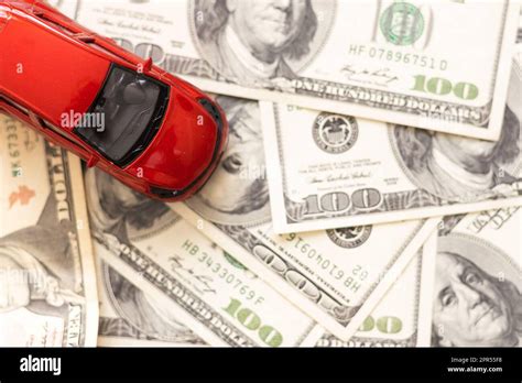 Toy Car Money Documents The Concept Of Buying And Insuring Cars Car