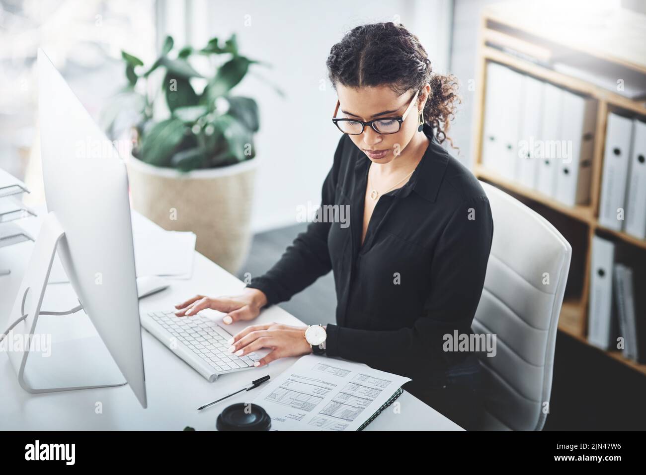 Typing Up A Few Important Notes A Young Businesswoman Going Through