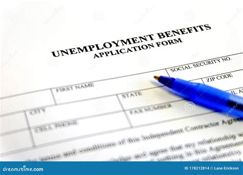 Unemployment Benefits Application Form With Paperwork Stock Photo