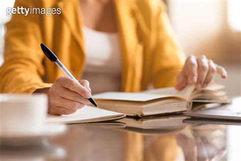 Unrecognizable Businesswoman Doing Paperwork Closeup Of Hands Taking