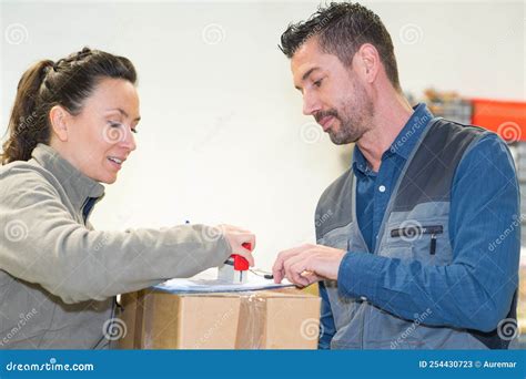 Woman Stamping Paperwork Courier Stock Image Image Of Receipt Business 254430723