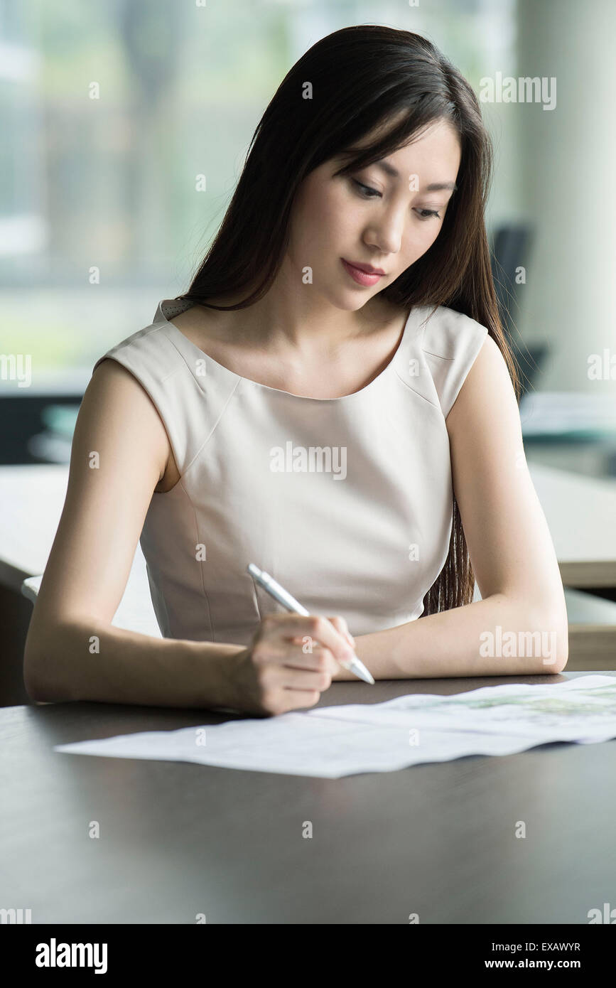 Worker Doing Paperwork In His Office Stock Photo Alamy